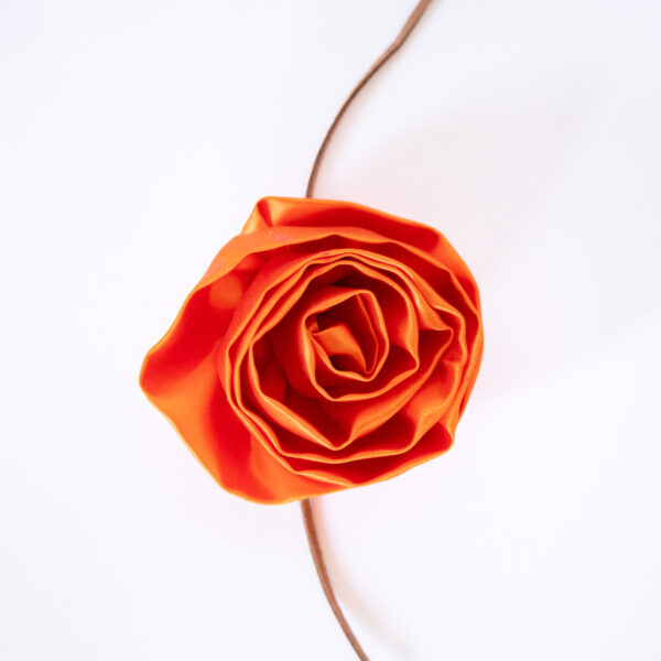 orange silk rosette flower