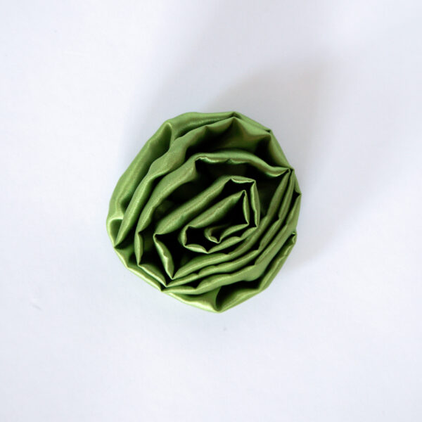 green rosette pin